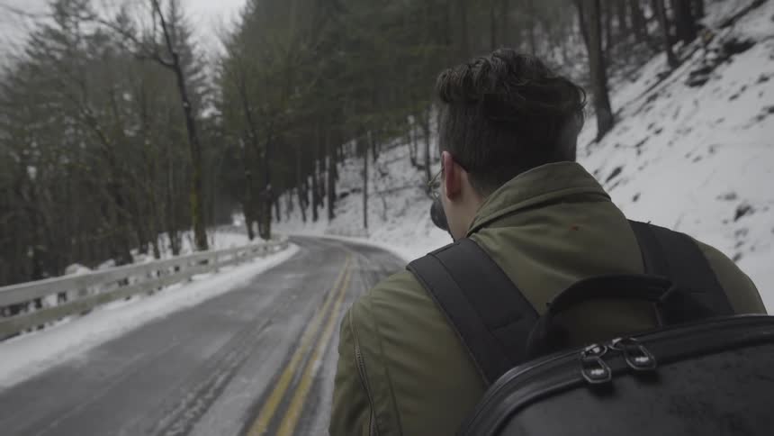 Man Taking Photos In Winter
