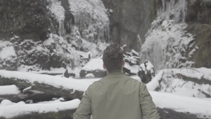 Man Taking Photos In Winter