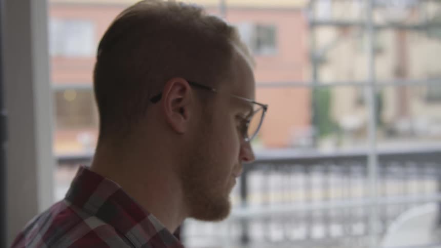 Man Working At Coffee Shop