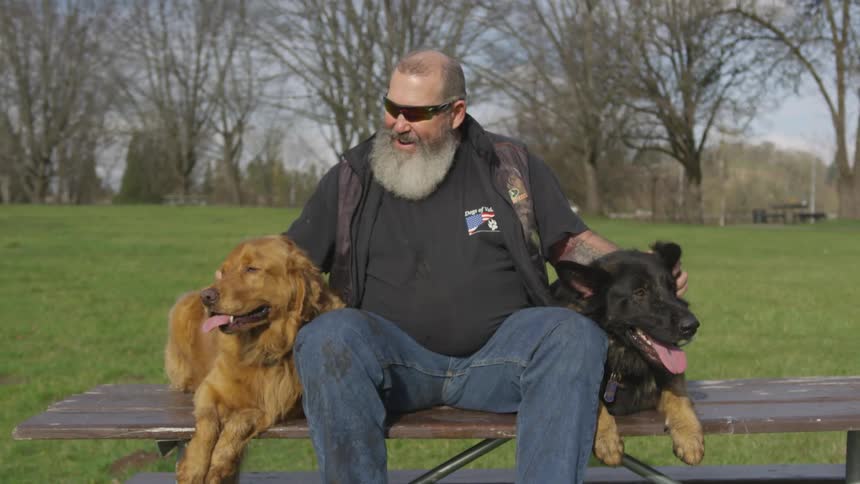 Man With Bible And Dogs