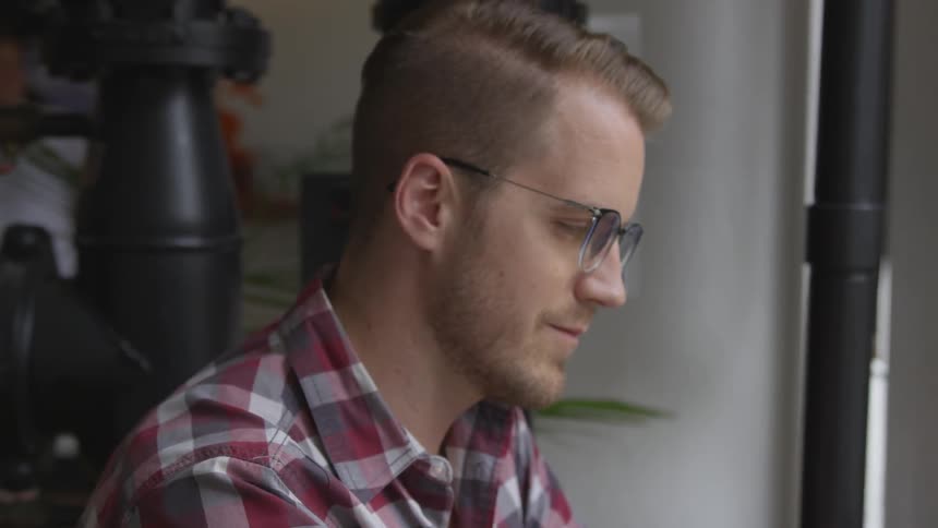 Man Working At Coffee Shop
