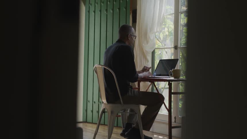 Man Working At Desk