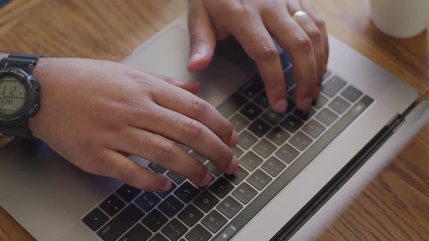 Man Working On Computer At Home