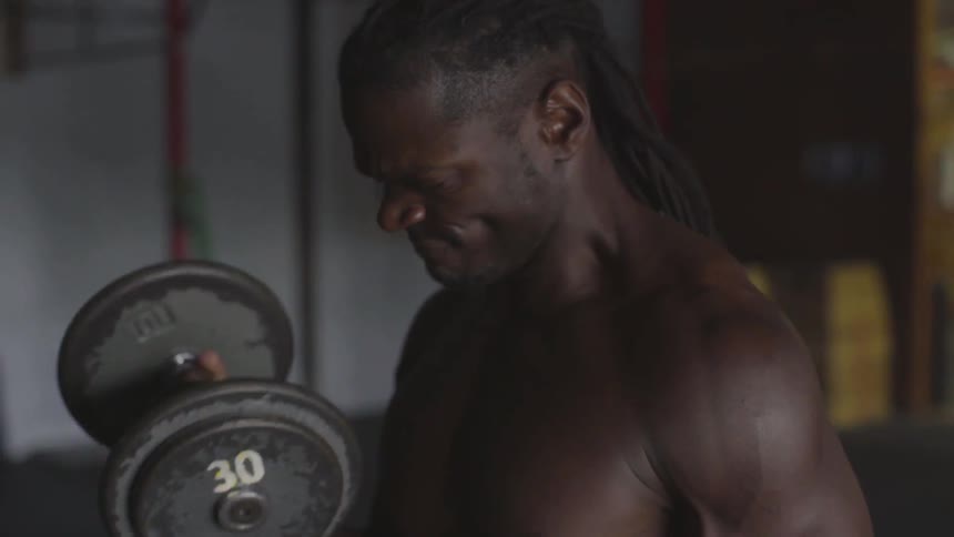 Man Working Out In Gym