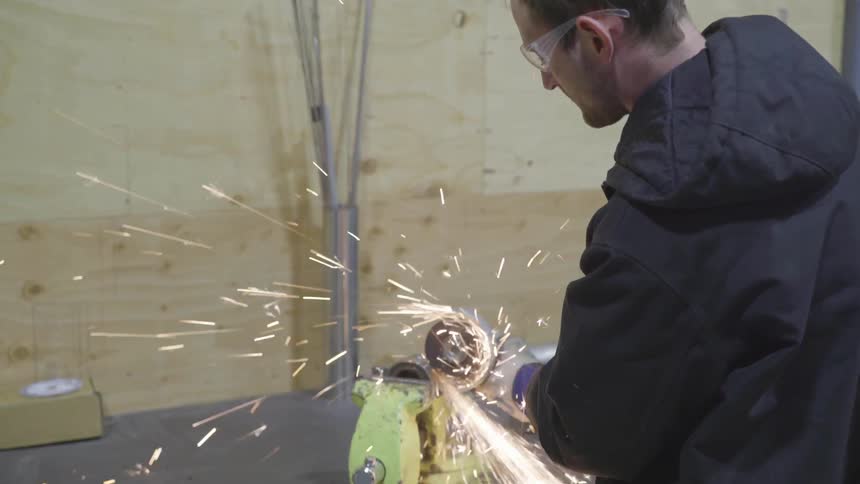 Mechanic Working On Car