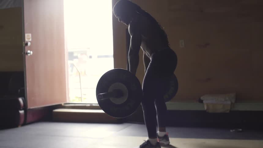 Man Working Out In Gym
