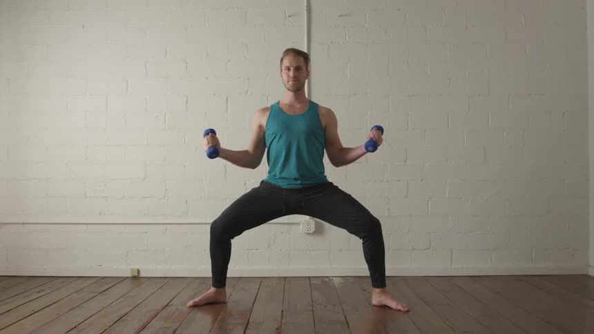 Man Working Out In Empty Room