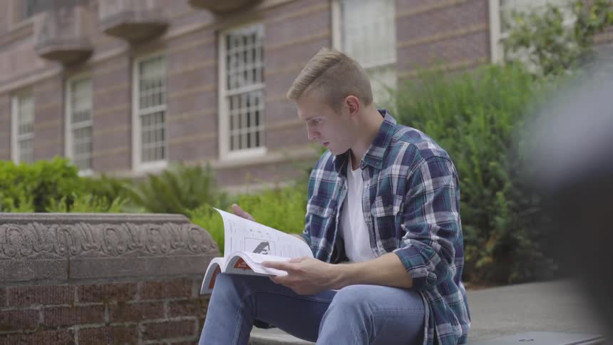 Man Studying On Campus