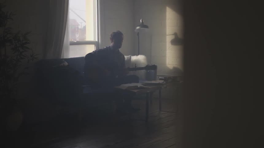 Musician In Small Apartment In New York City