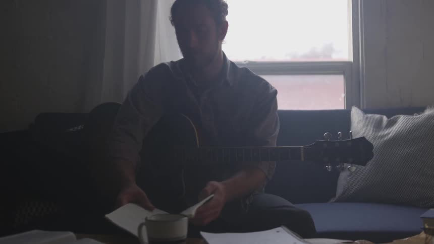 Musician In Small Apartment In New York City