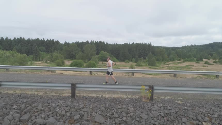 Middle Aged Man Jogging