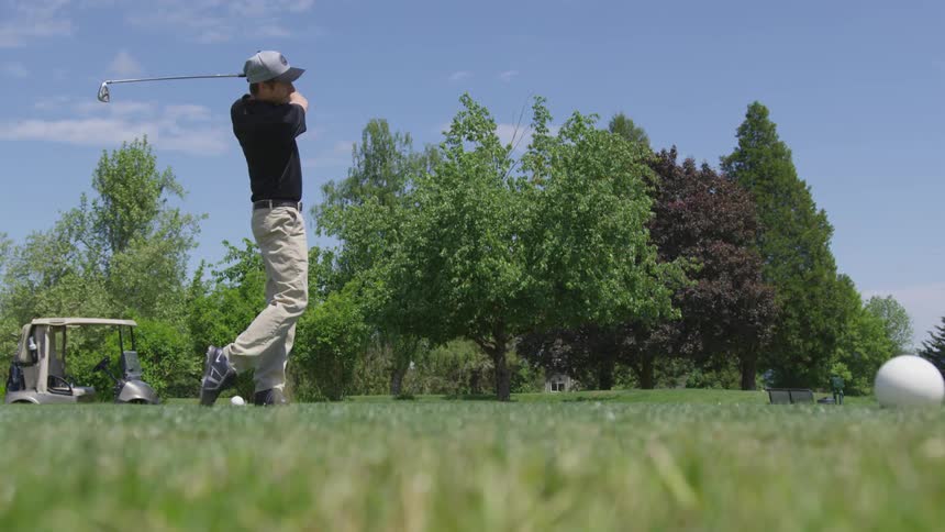 Men Playing Golf