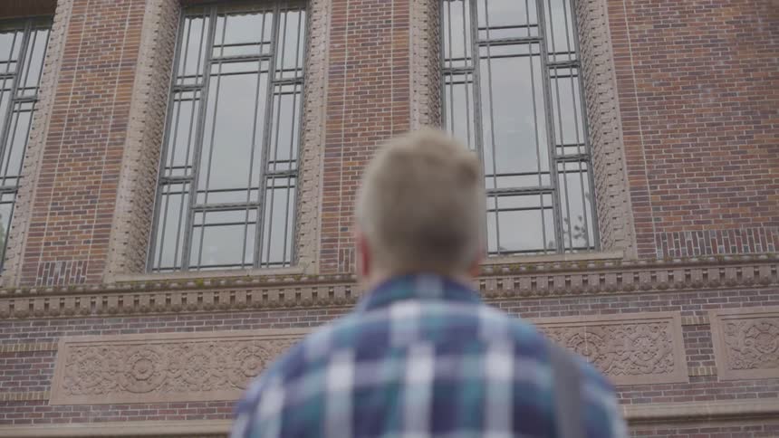 Man Studying On Campus