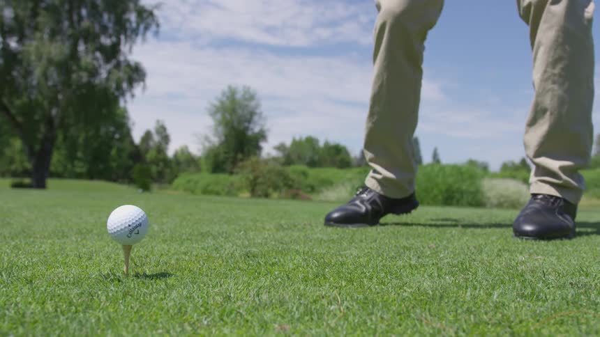 Men Playing Golf