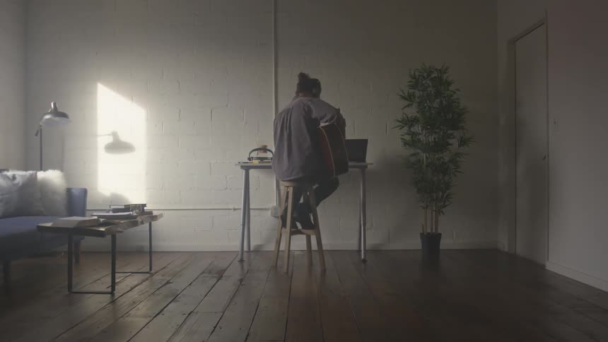 Musician In Small Apartment In New York City