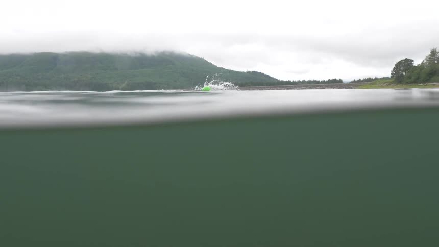 Man Swimming In Lake