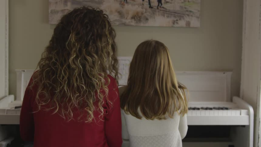 Mom And Daughter At Christmas Time