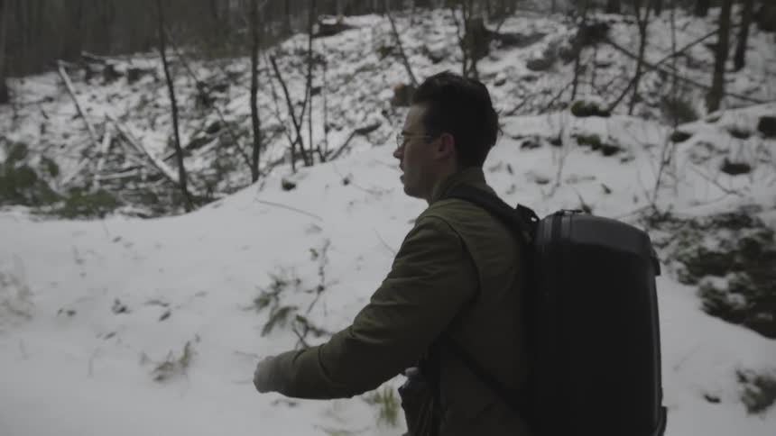 Man Taking Photos In Winter