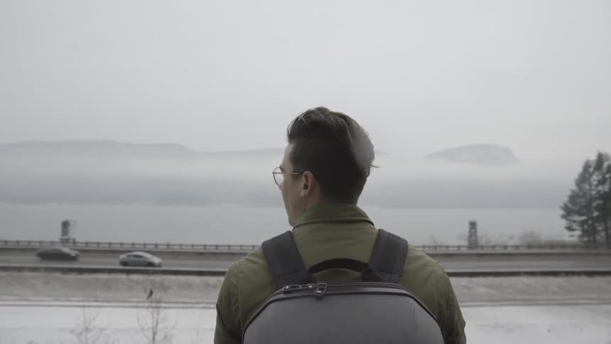 Man Taking Photos In Winter