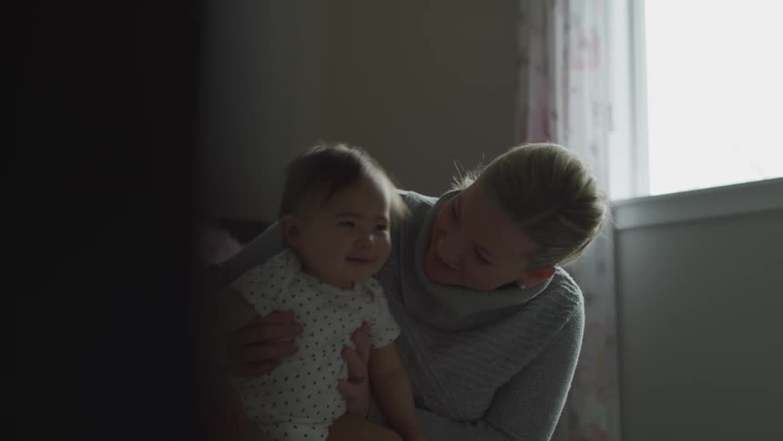 Mom And Daughter At Home