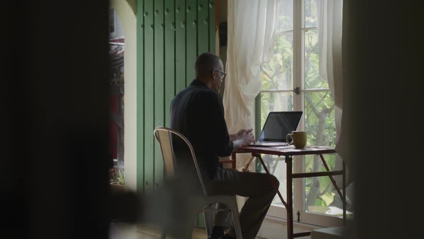 Man Working At Desk