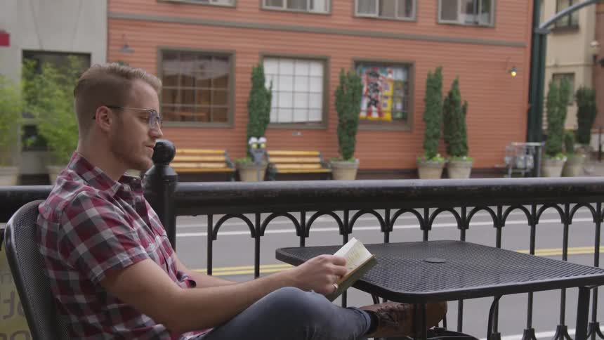Man Working At Coffee Shop