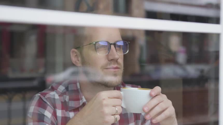 Man Working At Coffee Shop