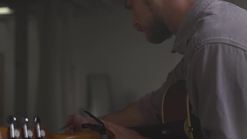 Musician In Small Apartment In New York City