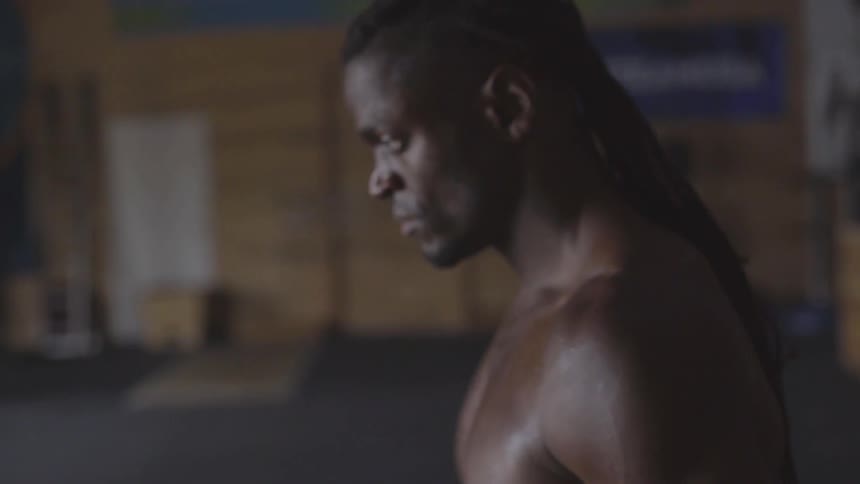 Man Working Out In Gym