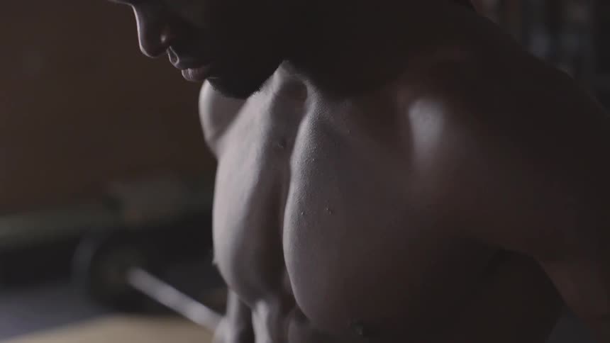 Man Working Out In Gym