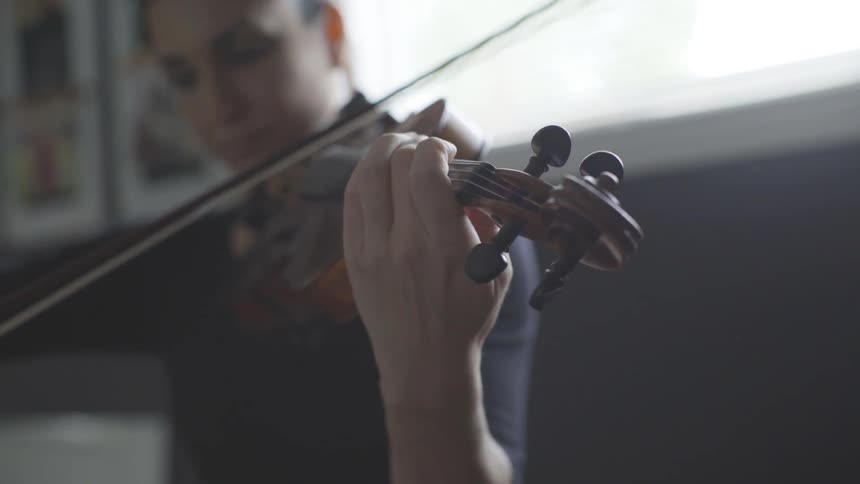 People Playing Violin