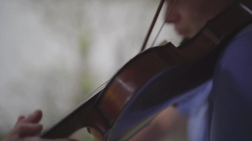 People Playing Violin