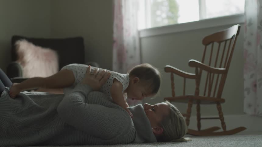 Mom And Daughter At Home