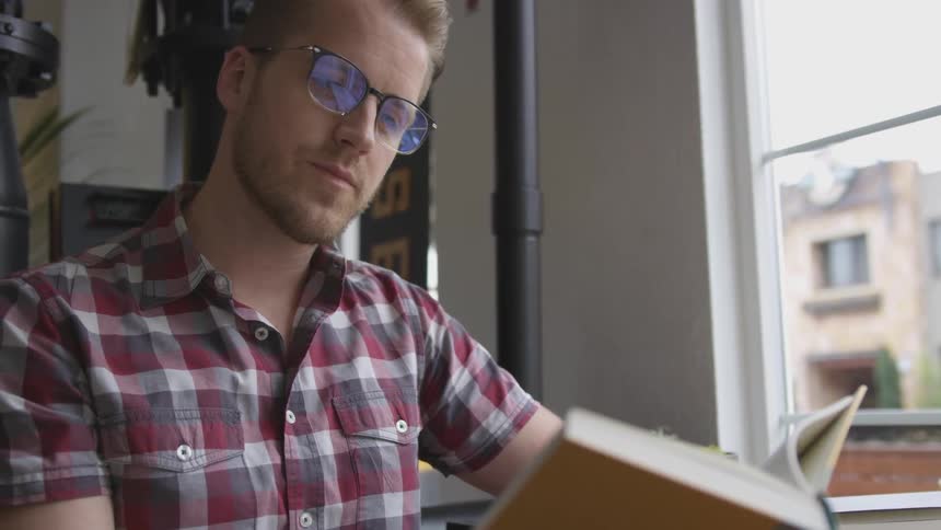 Man Working At Coffee Shop