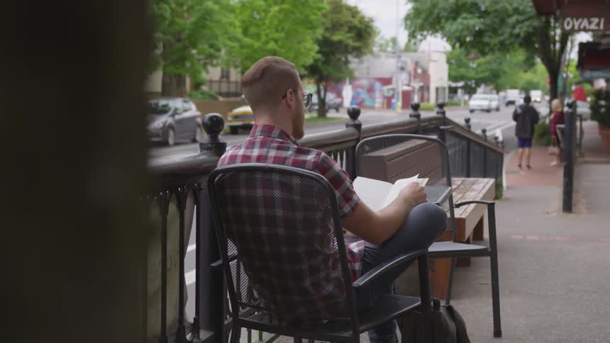 Man Working At Coffee Shop