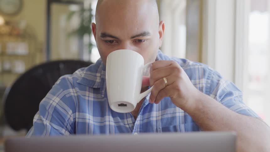 Man Working On Computer At Home