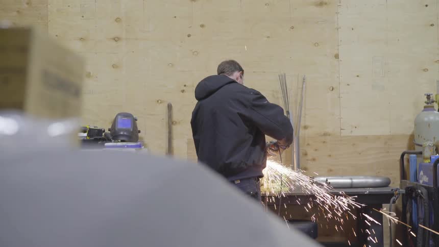 Mechanic Working On Car
