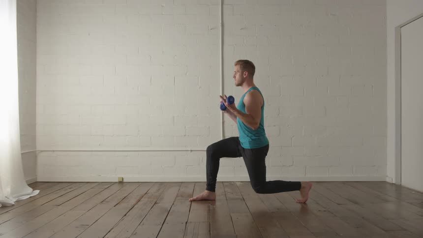 Man Working Out In Empty Room