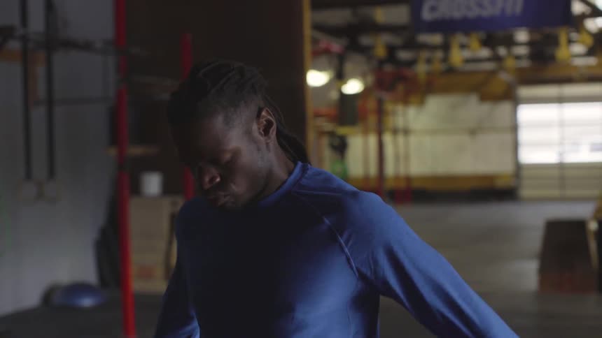 Man Working Out In Gym