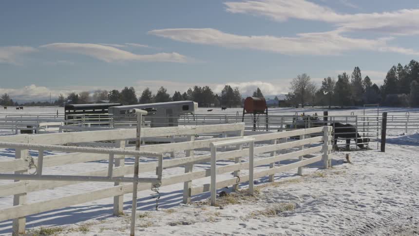 People Riding Horses In Snow