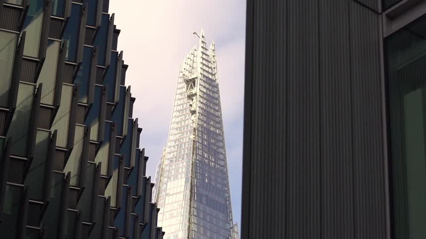 Looking up at city buildings
