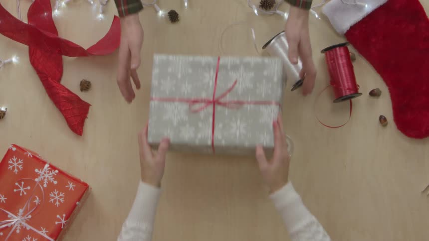 Person Wrapping Gifts