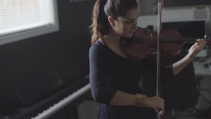 People Playing Violin