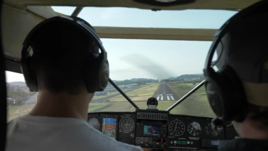 Pilot Flying Plane Through Snowy Mountains