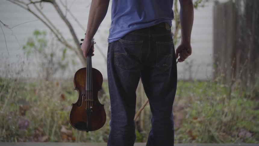 People Playing Violin
