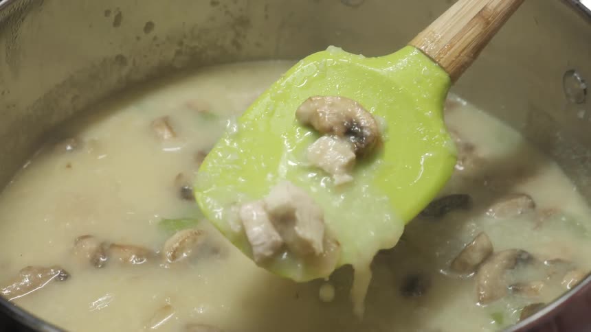 Person Making Food In The Kitchen