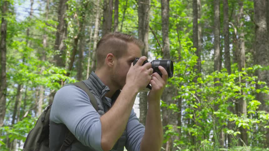 Photographer Hiking In Nature