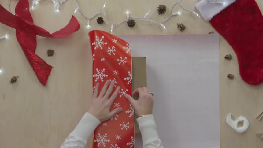 Person Wrapping Gifts