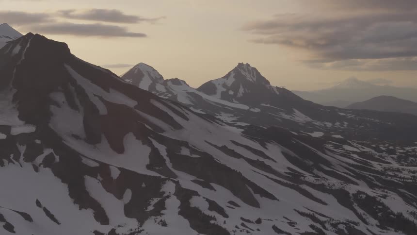 Pilot Flying Plane Through Snowy Mountains