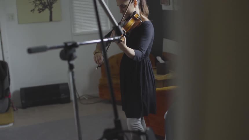 People Playing Violin